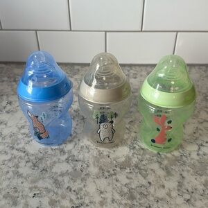 Three Tommee Tippee Bottles